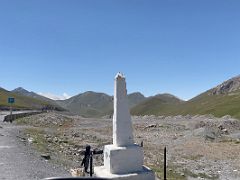 10C Memorial to engineer Yuri Frantsevich Grushko who helped design and construct the road across the Taldyk Pass 3615m on the way to Lenin Peak Base Camp
